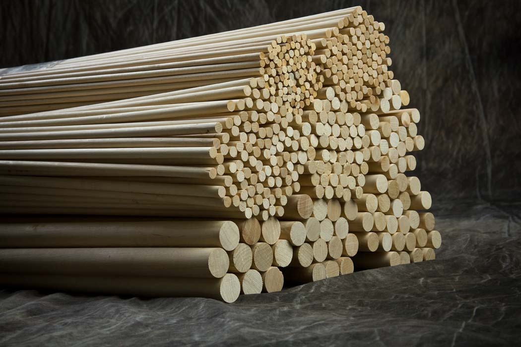 A stack of wooden dowels.